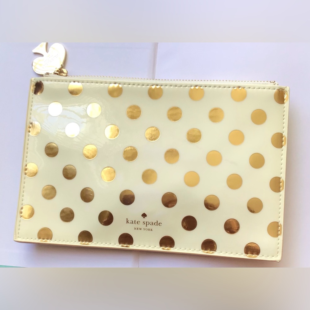 Kate Spade Pencil Case Gold Polka Dot with pencils, ruler, eraser and sharpener.